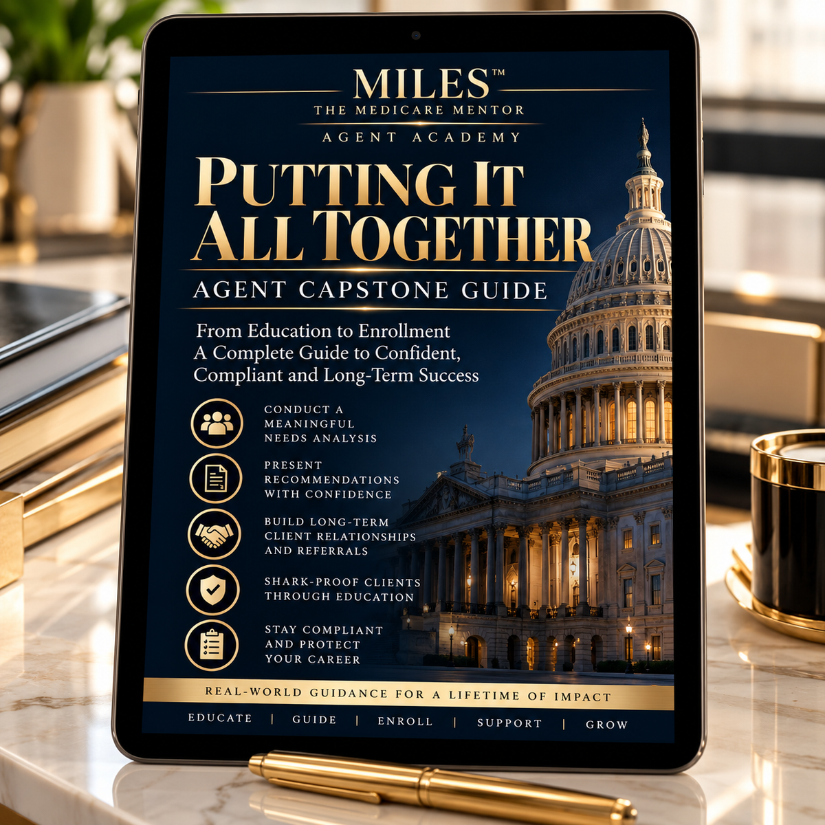 Putting It All Together Agent Capstone Guide tablet on marble desk, navy and gold Capitol cover